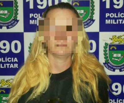 Mulher com arma de fogo é detida pela Polícia Militar